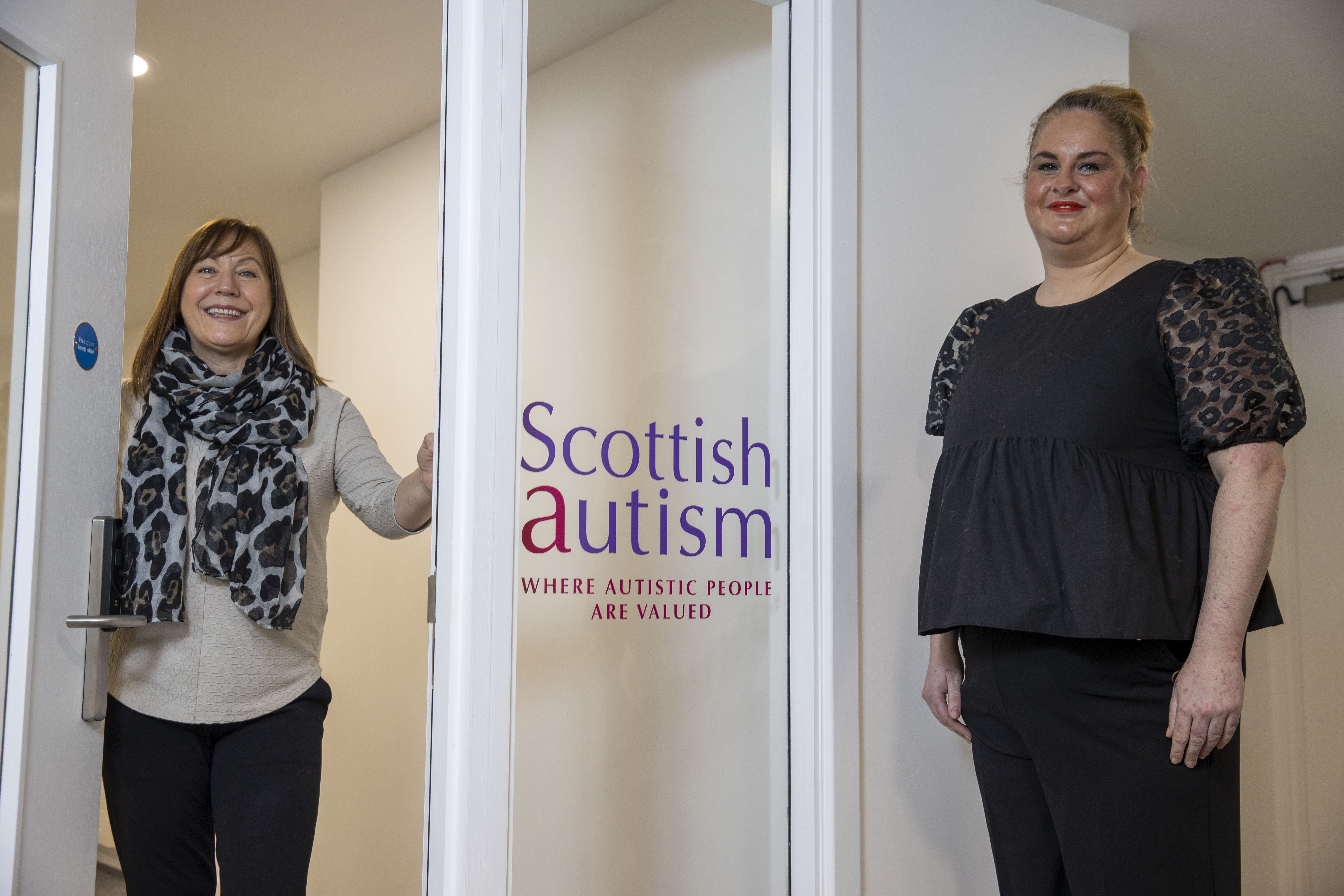 Queens Cross Housing Association’s chief executive, Shona Stephen welomes Scottish Autism’s Senior Autism Practitioner Colleen McMahon to the new facility in Springbank Street.